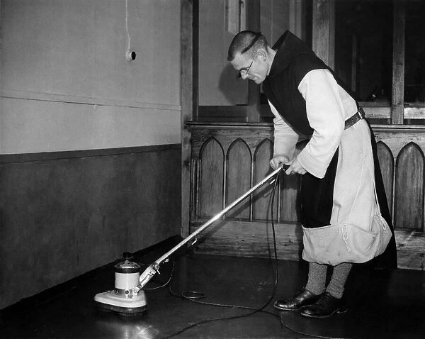 Monk cleaning the monastary floor. February 1948 P000186