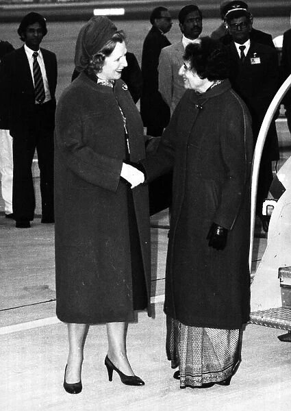 Mrs Indira Gandhi being met at Heathrow by Mrs Margaret Thatcher March 1982