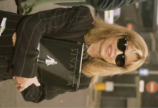 Nancy Sinatra Singer arriving at Heathrow from New York to promote her new book Frank
