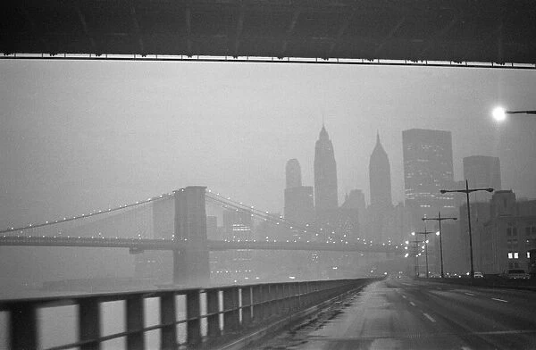 New York skyline and Brooklyn Bridge seen from the FDR Drive 25th January 1970