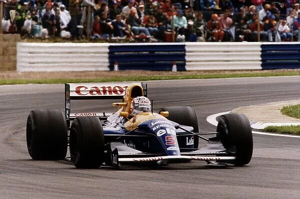 Nigel Mansell Motor Racing Formula One Grand Prix Driver driving his Williams Renault car