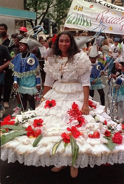Notting Hill Carnival 1991 Men and women dress up in costumes during