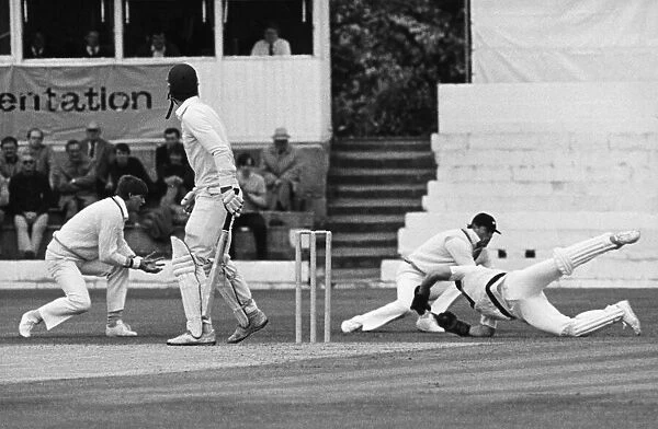 Over and Out. Yorkshire wicketkeeper Steven Rhodes dives to take a spectacular catch in