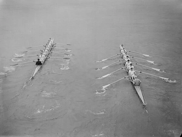 Oxford (Left) edge into the lead against Cambridge in the 100th University boat race