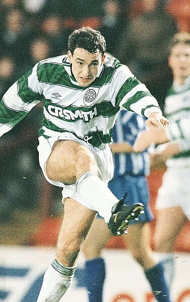 Paul McStay kicking ball Celtic strip Football
