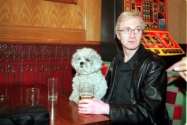 Paul O Grady aka Lily Savage with dog May 1999 drinking pint of lager in Griffin pub