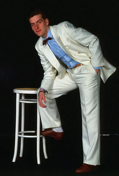 Peter Capaldi modelling white suit May 1983