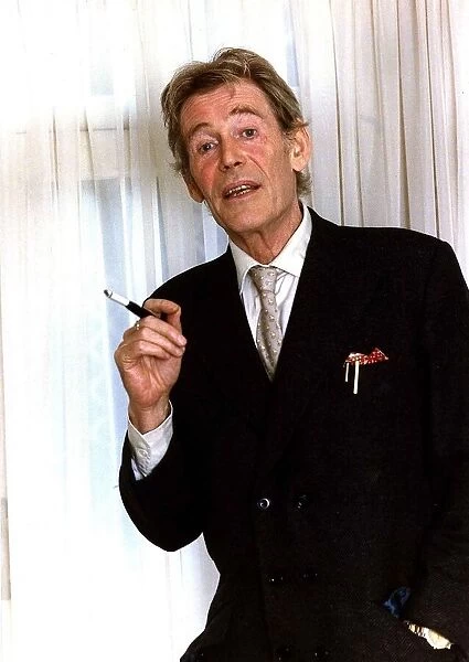 Peter O Toole actor smoking a cigarette in a cigarette holder December 1988