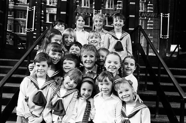 Petula Clark with the final selection of 18 children, three groups of six