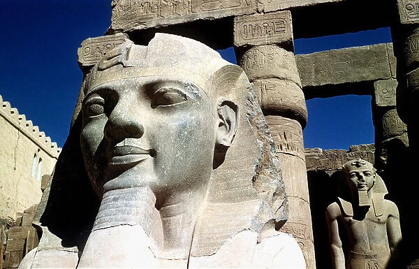 Places: Egypt - Luxor - Ancient Statue Ramses II 2nd. Close up of the carved