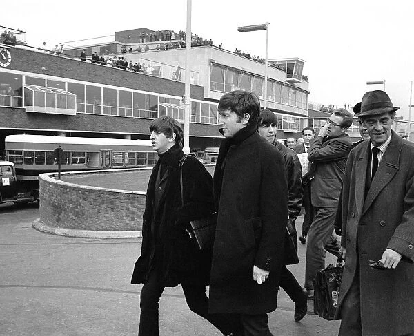 Pop Group The Beatles at London Airport, after arriving from Belfast 9th November
