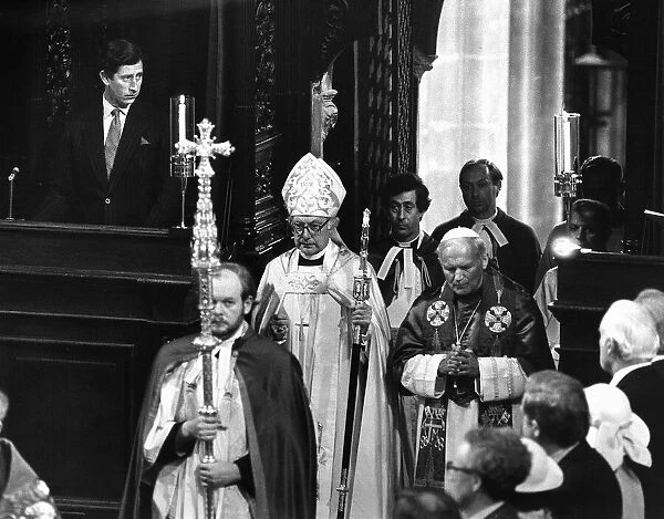 Pope John Paul II, vist to Britian May 1982. Prince Charles watches as the Pope
