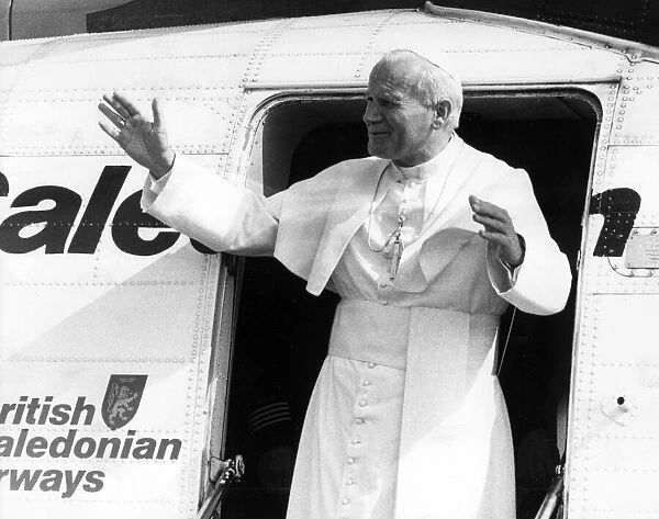 Pope John Paull IIs visit to Coventry. The Holy Father steps out of the helicopter