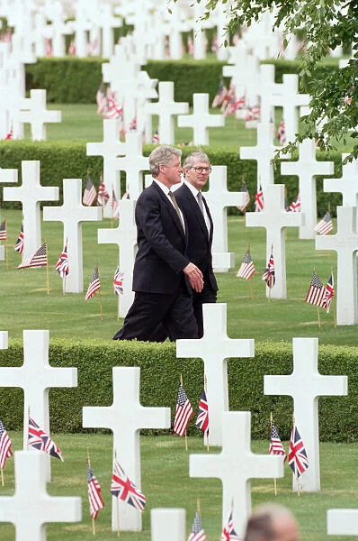 Prime Minister John Major, and US President Bill Clinton walking through the American