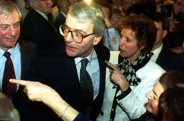 Prime Minister John Major and his wife Norma arrive at a Conservative Council meeting in