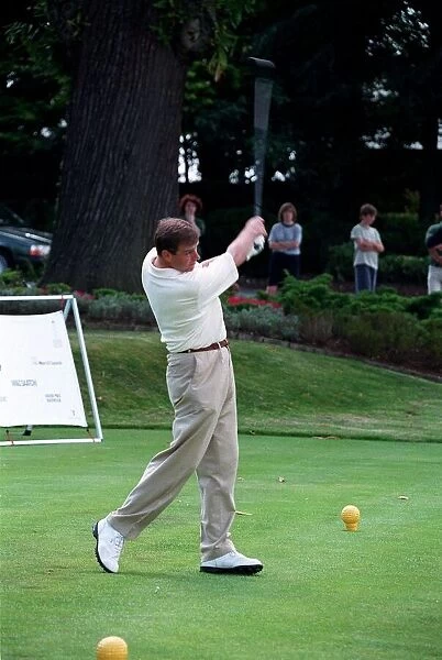 Prince Andrew July 98 Hitting golf ball on golf tee at a golf tournament