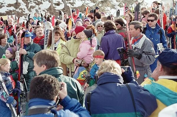Prince Charles at the foot of a Swiss ski lift above Klosters with sons William, 11