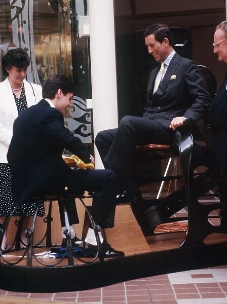 Prince Charles getting a shoe shine at the Glasgow Garden Festival 1988