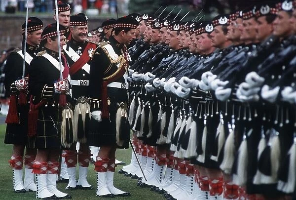 Prince Charles inspecting the ranks in full Scottish military outfit July 1988