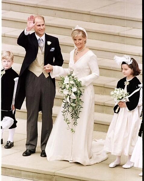 Prince Edward and his new bride Sophie Rhys Jones 1999 after their wedding stand