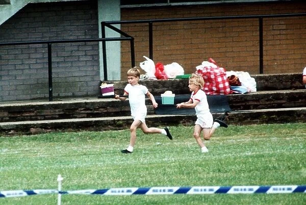Prince William finishes first in the relay race at his Sports Day event