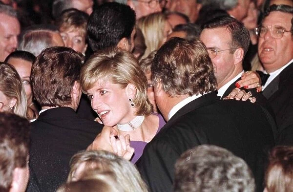 Princess Diana dances with American millionaire tool manufacturer Michael Wilkie at a