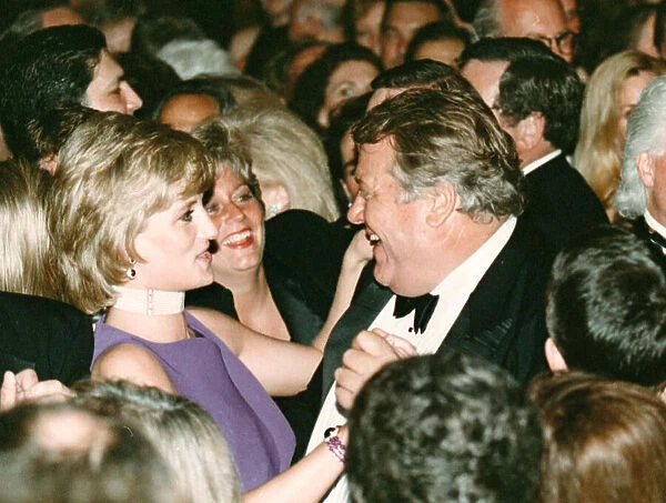 PRINCESS DIANA DANCES WITH DAVID WILKIE AT A CHARITY BASH DURING HER VISIT TO CHICAGO