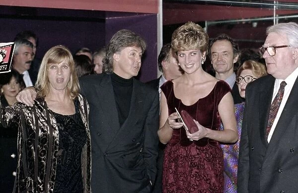 Princess Diana meeting Paul McCartney and his wife Linda after a performance of his