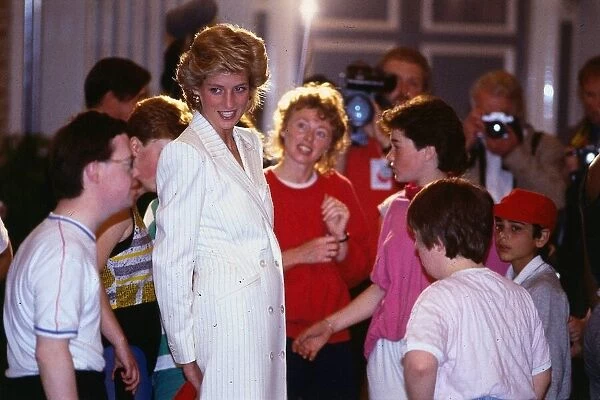 Princess Diana Princess of Wales talking to handicapped children during a visit to