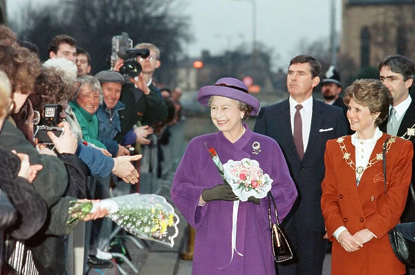 Queen Elizabeth II visits Huddersfield to open a rugby club. 30th November 1990