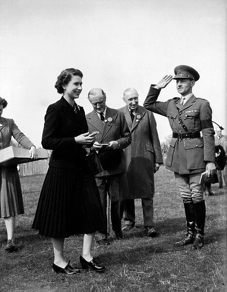 Queen Elizabeth with Major JWC Weldon at Badmington Horse trials. May 1953