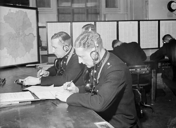 Radio and telegraph officers on duty in Scotland Yards information room
