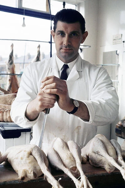 Referee Jack Taylor pictured in his job as a butcher in Wolverhampton, 1970