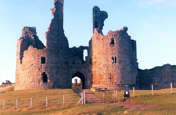 The remote and impressive ruins of Northumberlands Dunstanburgh Castle in April 1997