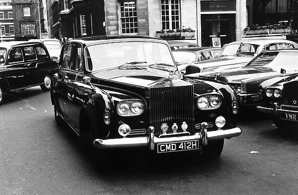 Richard Burton at the wheel of his Rolls Royce in 1970 a present from wife