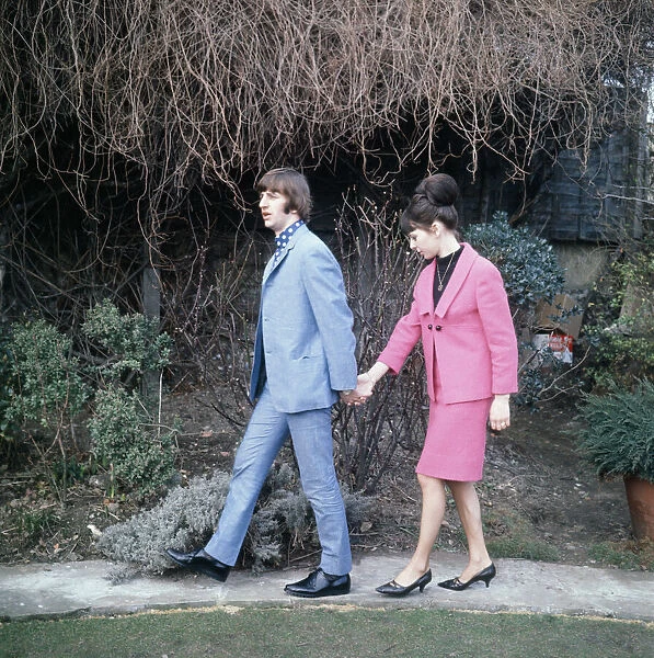 Ringo Starr walks along holding the hand of his Bride Maureen Cox 11 February 1965
