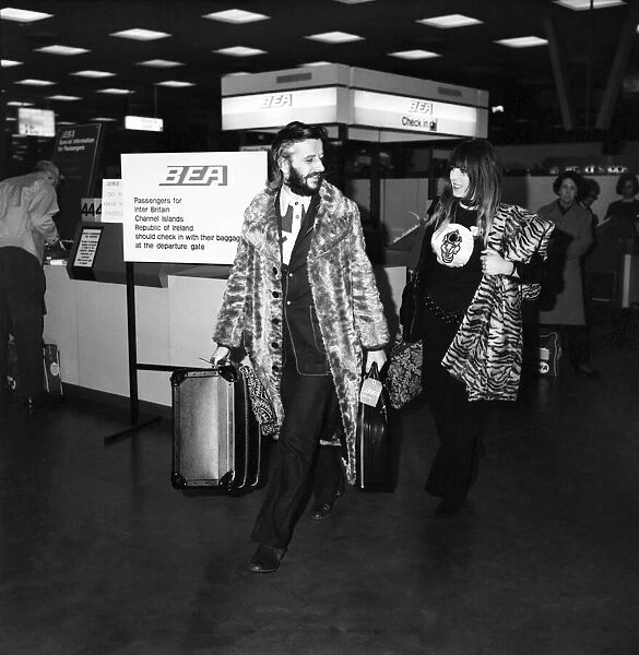 Ringo Starr and wife Maureen at Heathrow airport. April 1971 71-3731
