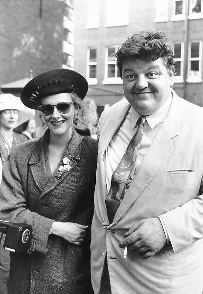Robbie Coltrane actor arriving with unknown lady for the wedding of Nigel Planer