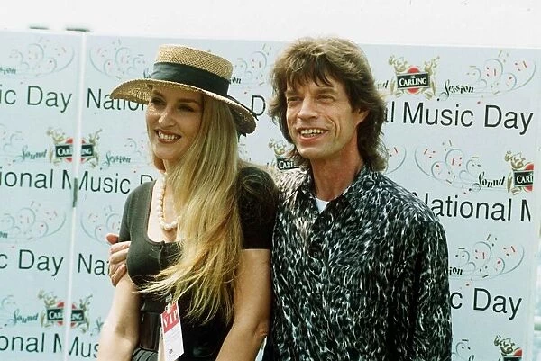 Rolling stones, Mick Jagger with wife Jerry Hall at National Music Day in May 1993