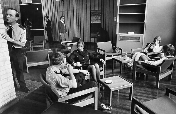 Scene at Mid Anglia Police Headquarters, with officers and staff relaxing in the lounge