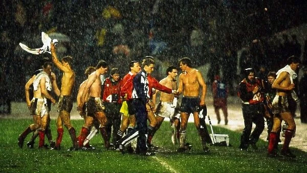 Scotland players leave pitch in heavy rain following their World Cup qualifier against