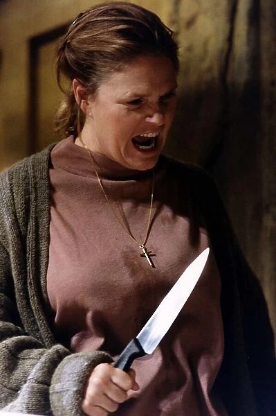 Sharon Gless Actress - holding a knife