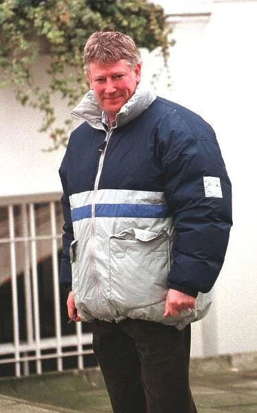 Shaun Scott actor walks his dog in Kensington February 1999