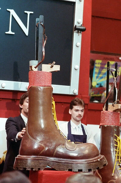 Sothebys auction of Elton John items. Eltons famous Doc Martin boots which he