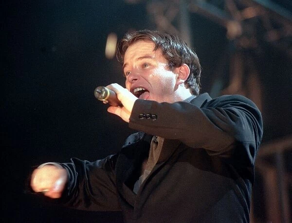 Steven Gateley of pop group Boyzone December 1999 singer singing performing at the SSEC