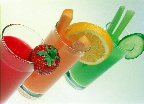 Strawberry Orange and Lime Fruit Juice in glasses June 1999