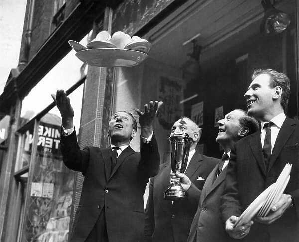 Street Traders: Sid Strong throws aloft a tray full of cups and saucers