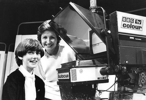 Sue Lawley with schoolgirl in BBC TV studio showing her the autocue - December 1980