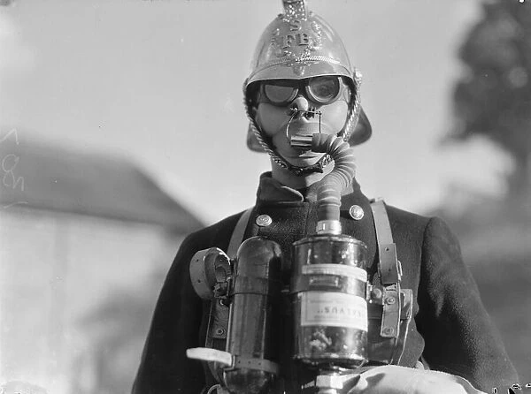 Surbiton Fire Brigade Display. October 1933 A fireman wearing smoke apparatus