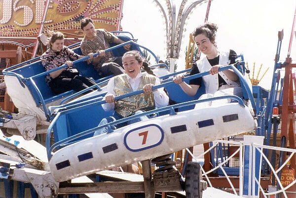 Teenagers enjoying one of the fairground rides at the Crock Fair, Coventry 30th May 1994